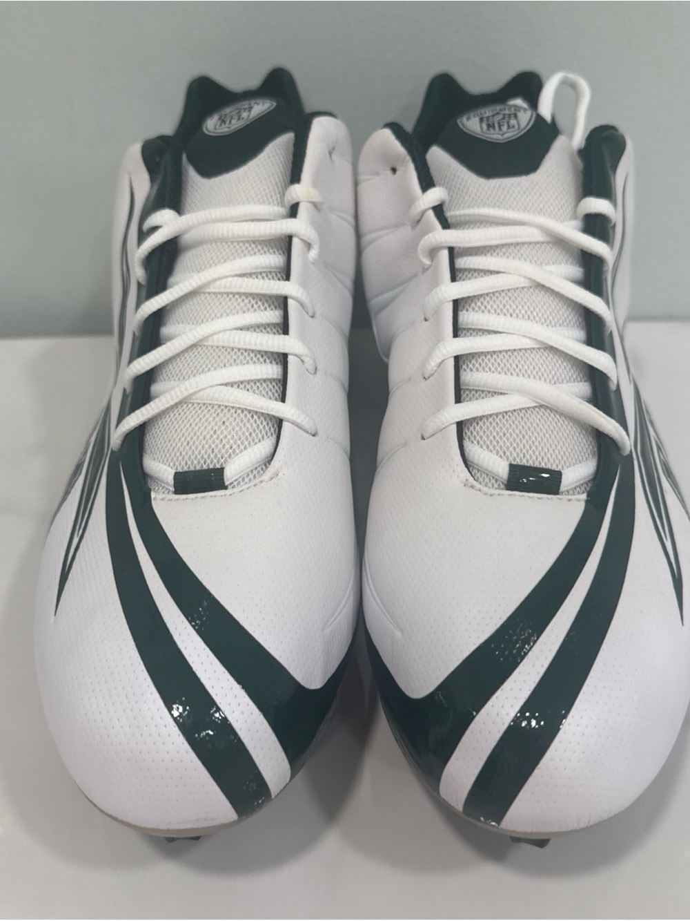 White Football Cleats with Dark Green Accents